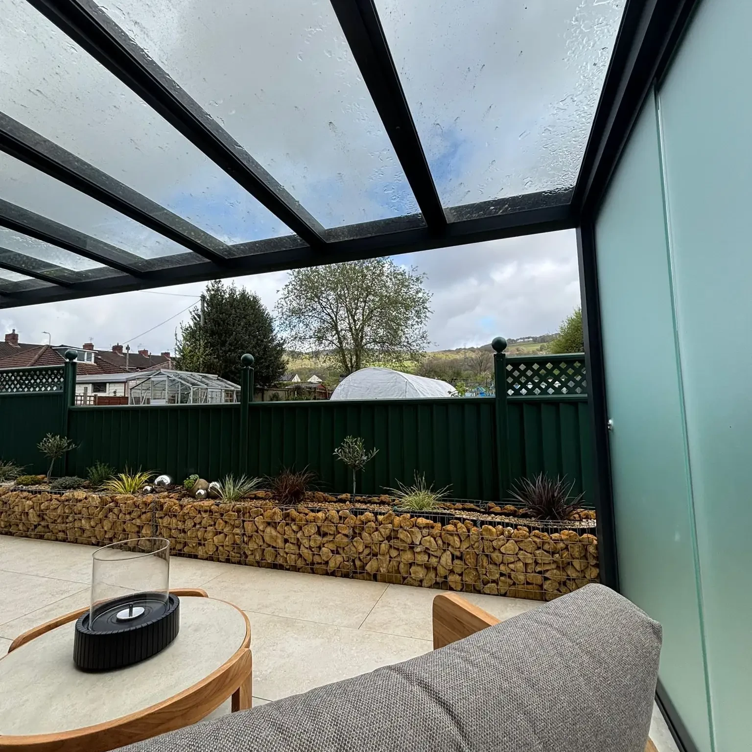 CubeLine Slim veranda with a flat front profile and glass roof